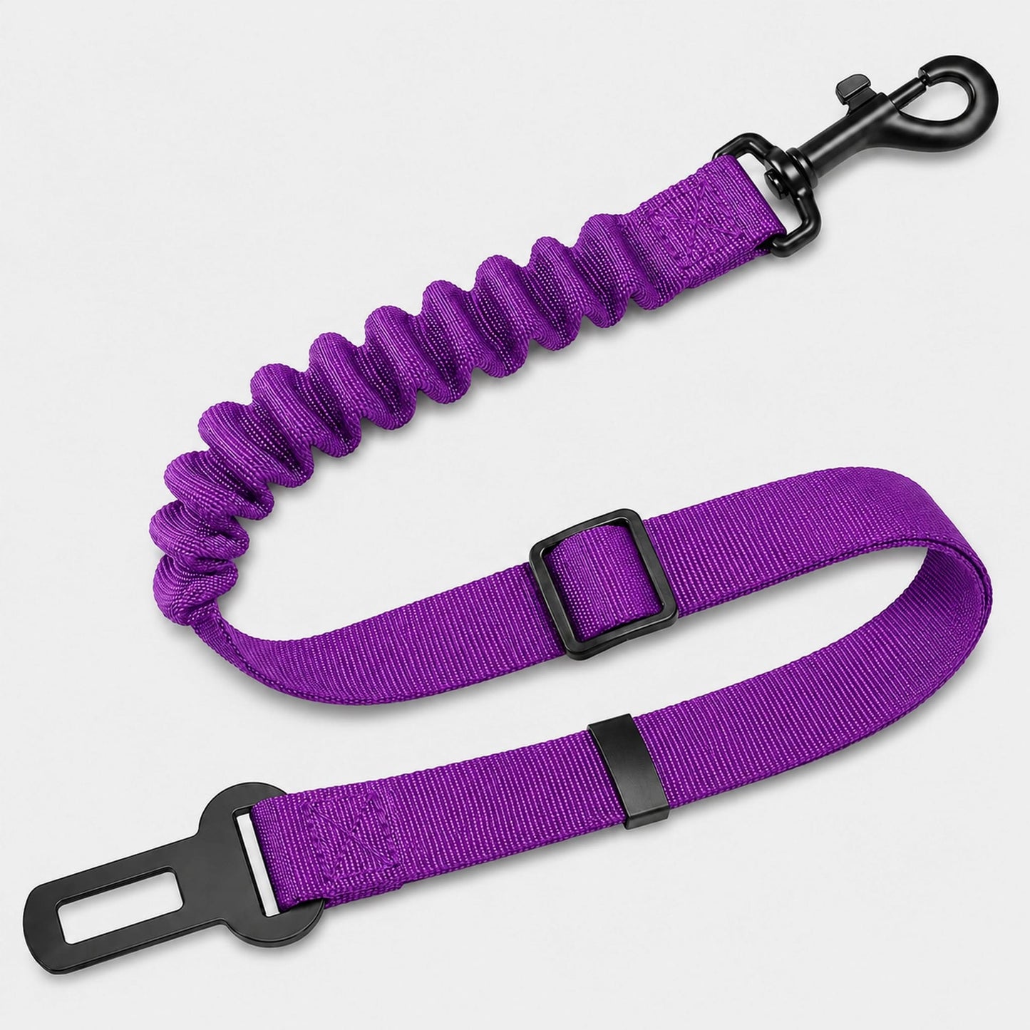 A purple elastic bungee leash with black metal hardware, including a snap hook, carabiner clip, and adjustment buckle, shown on a light gray background.